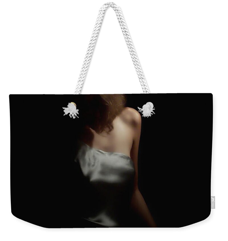 Woman Weekender Tote Bag featuring the photograph Faceless Passion by Donna Blackhall