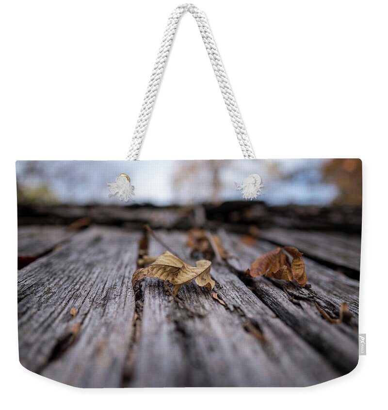 Barn Weekender Tote Bag featuring the photograph Fallen Leaf on a Rustic Shed by Doug Ash