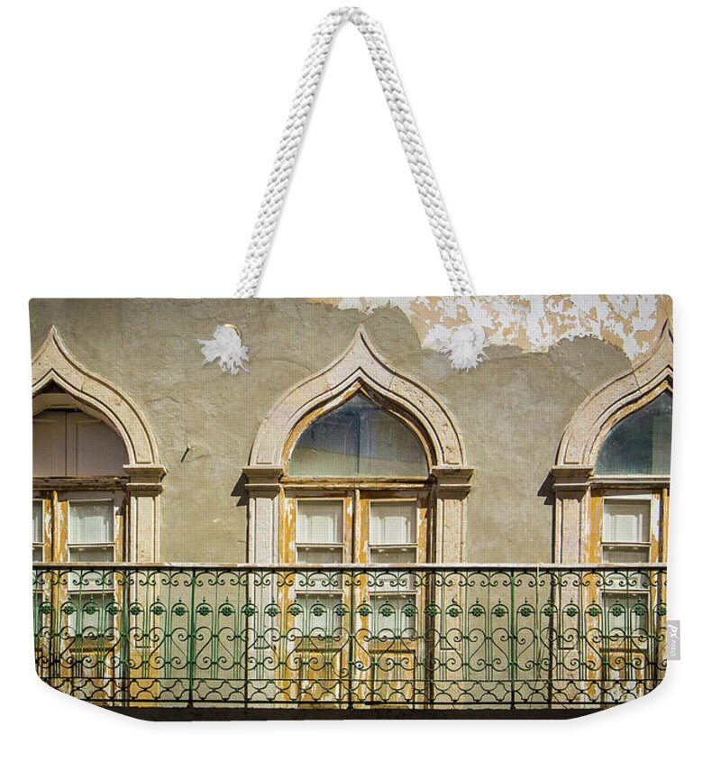 Faro Weekender Tote Bag featuring the photograph Faro Balcony by Nigel R Bell