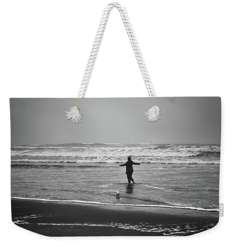 Beaches Weekender Tote Bag featuring the photograph Feeling Her Joy by Steven Clark