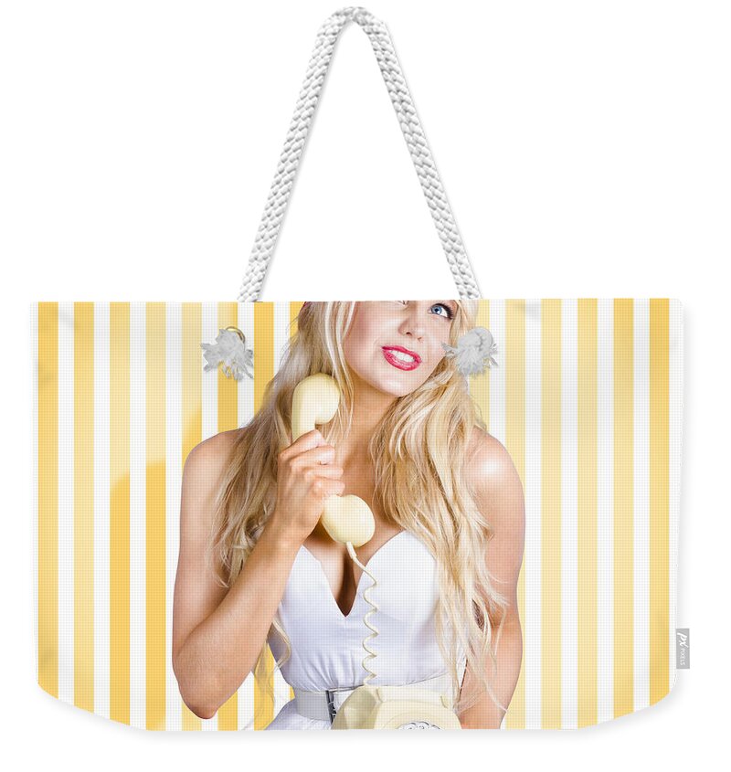 Vintage Weekender Tote Bag featuring the photograph Female model with phone in classic retro fashion by Jorgo Photography