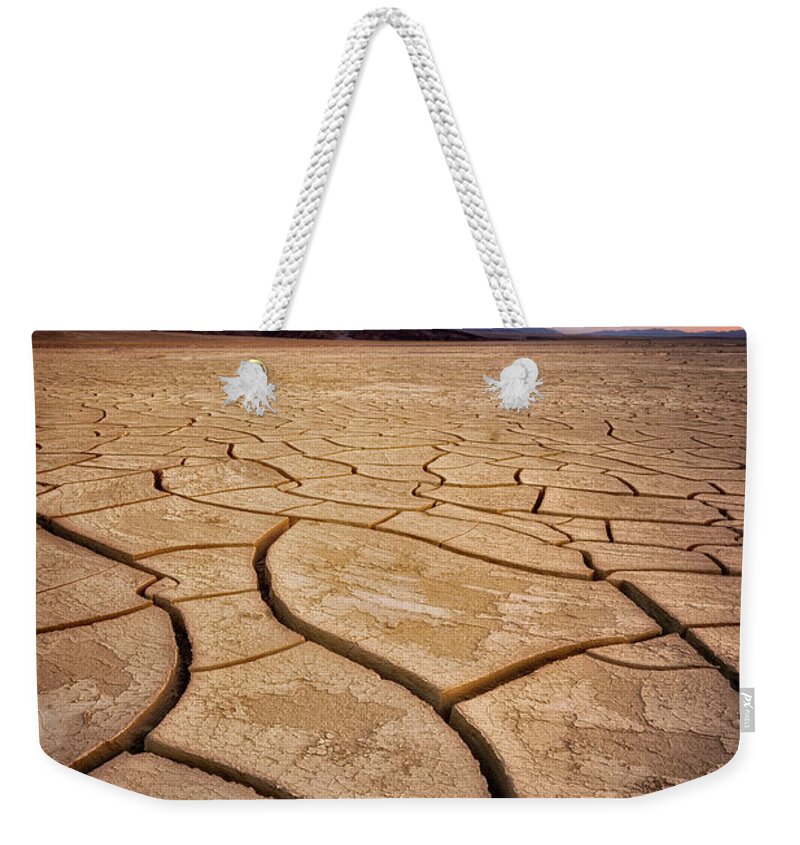 Desert Weekender Tote Bag featuring the photograph Field of Cracks by Nicki Frates