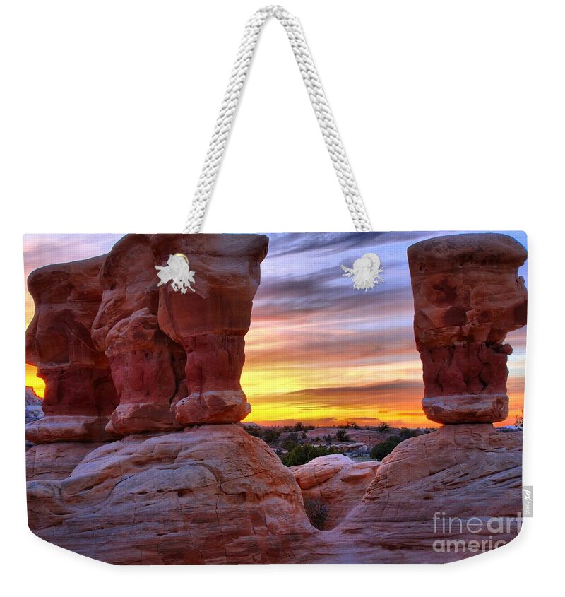 Devils Garden Weekender Tote Bag featuring the photograph Fire And Faces by Adam Jewell