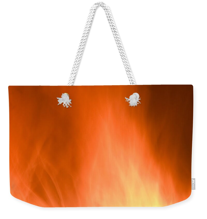 Flames Background Weekender Tote Bag featuring the photograph Fire flames abstract background by Michalakis Ppalis