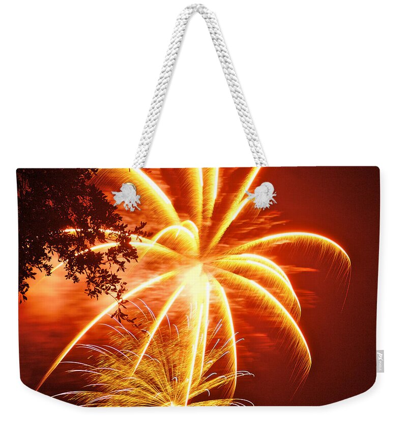 July 4th Weekender Tote Bag featuring the photograph Fire in the Trees by Phill Doherty