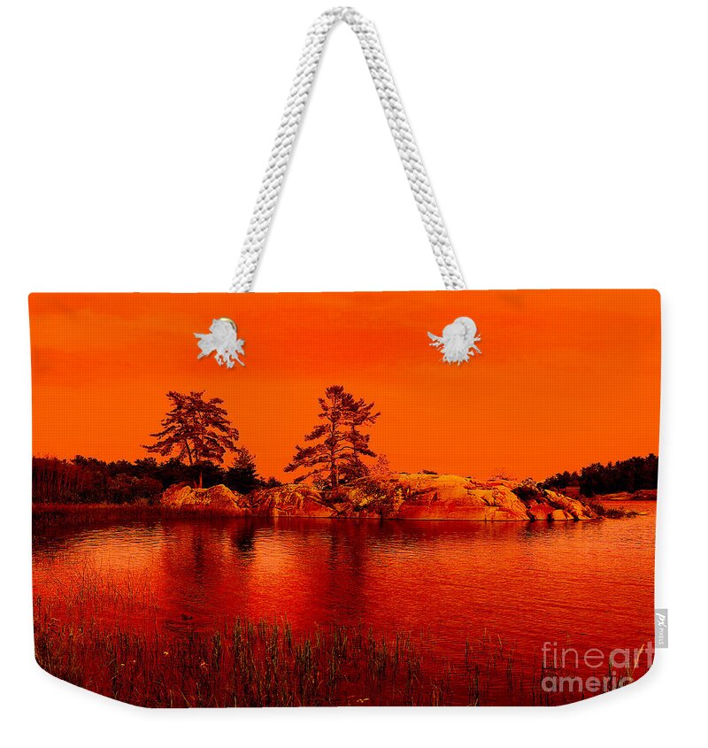 Killarney Weekender Tote Bag featuring the photograph Fire on the Water by Nina Silver