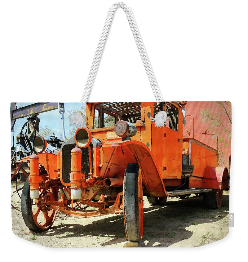 Fire Truck Weekender Tote Bag featuring the photograph Fire Truck in Taft CA by Timothy Bulone