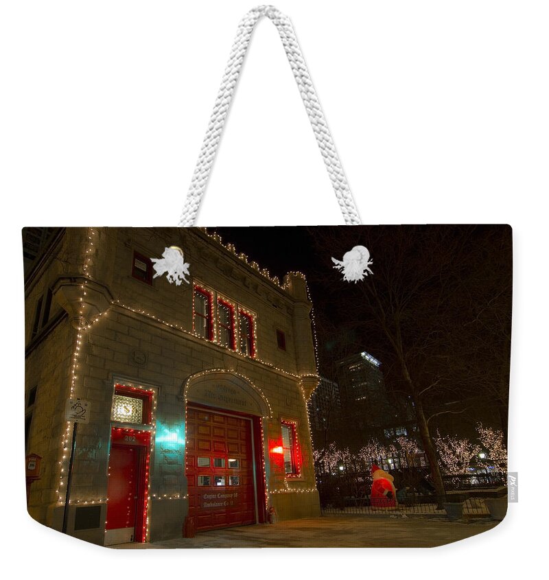 Firehouse Weekender Tote Bag featuring the photograph Firehouse in xmas lights by Sven Brogren