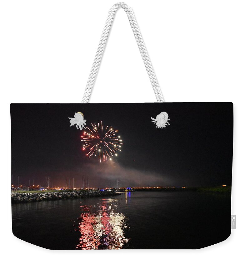 Fireworks Weekender Tote Bag featuring the photograph Fireworks Over Water 2 by Vicki Lewis