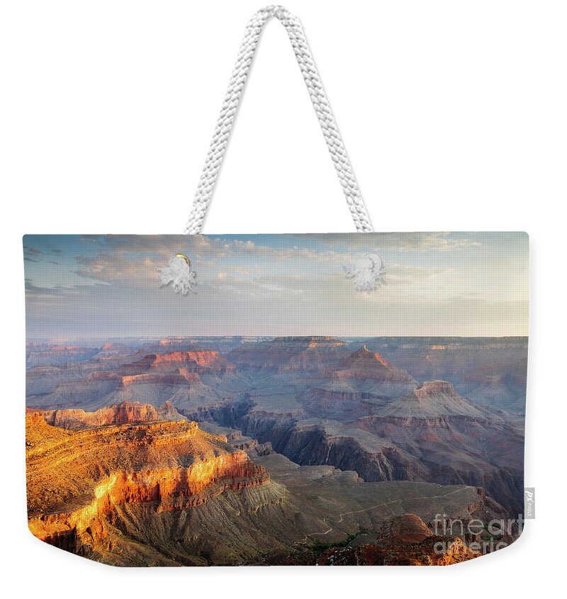 Grand Canyon Weekender Tote Bag featuring the photograph First light over Grand Canyon, Arizona, USA by Matteo Colombo