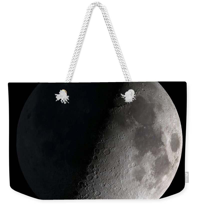 Mare Serenitatis Weekender Tote Bag featuring the photograph First Quarter Moon by Stocktrek Images