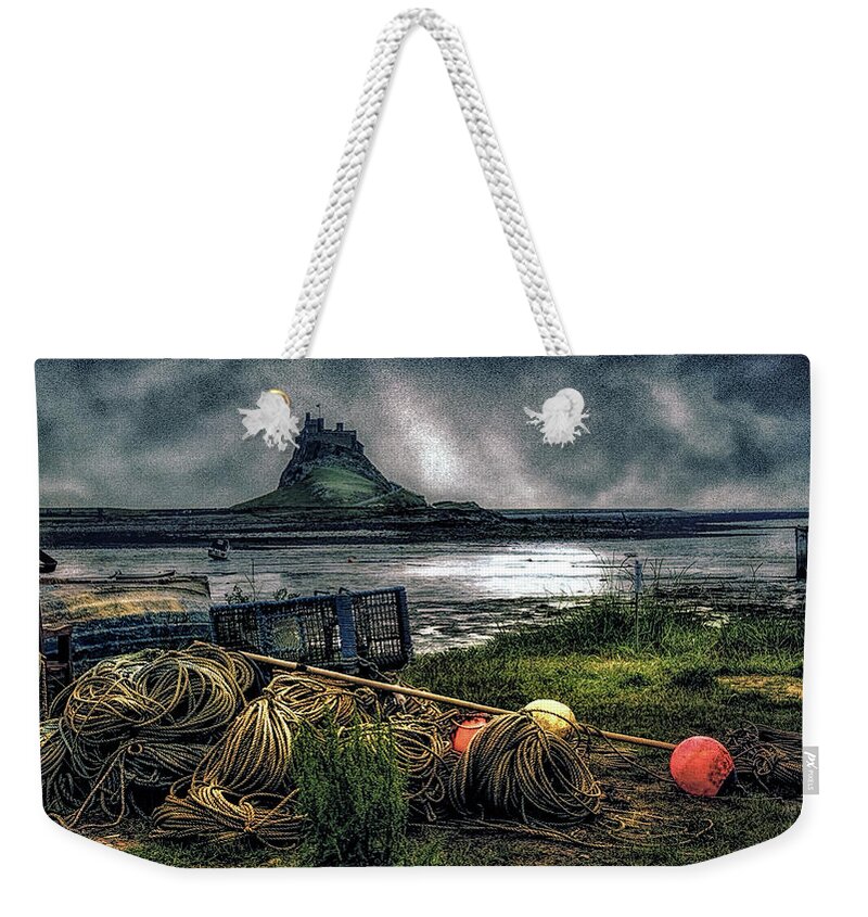 Fishing Gear Weekender Tote Bag featuring the photograph Fishing gear at Lindisfarne. by Brian Tarr