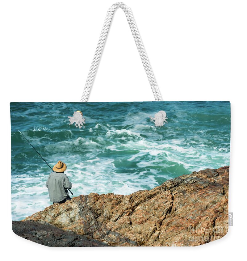 2017 Weekender Tote Bag featuring the photograph Fishing on Mutton Bird Island by Andrew Michael