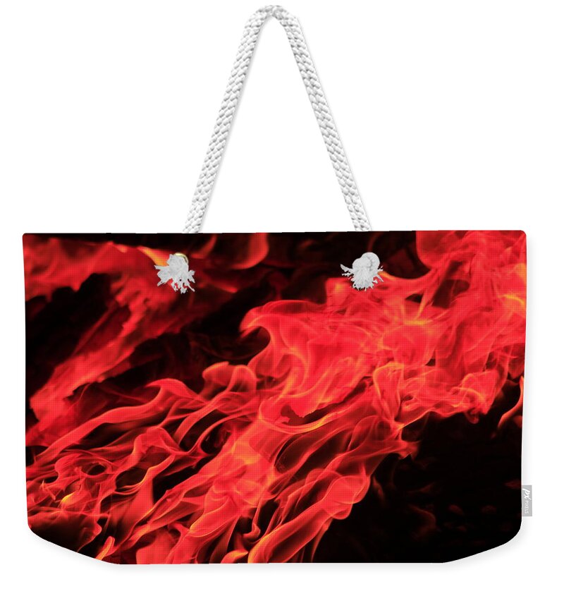 Yellow Weekender Tote Bag featuring the photograph Flame by Keith Sutton