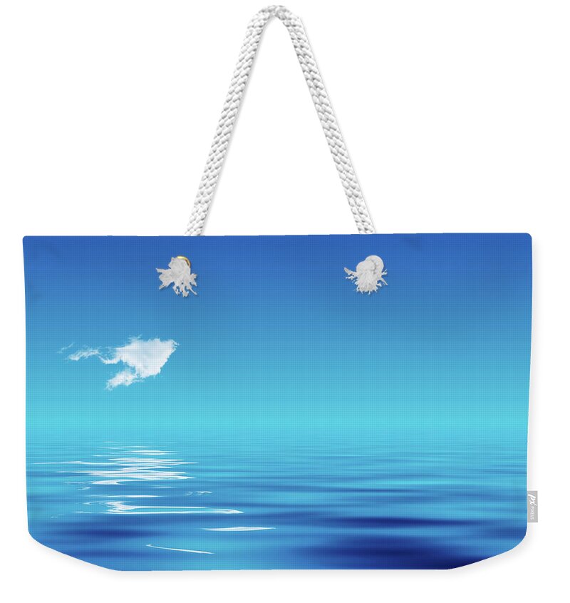 Cloud Weekender Tote Bag featuring the photograph Floating Cloud by Wim Lanclus