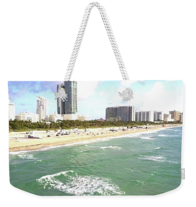 South Beach Weekender Tote Bag featuring the photograph Floating by Michael Albright