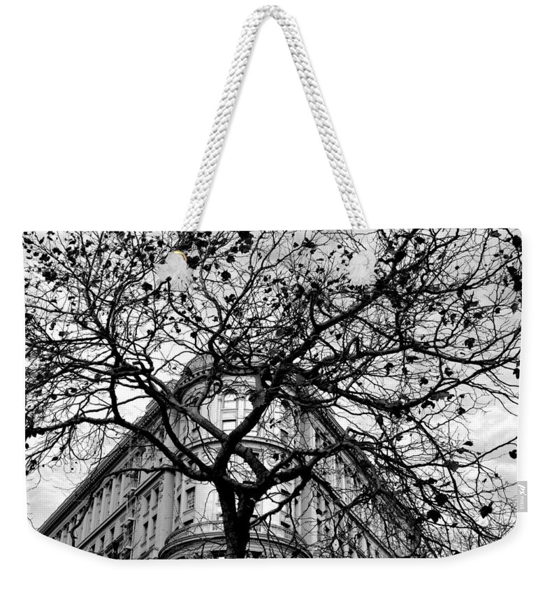 City Weekender Tote Bag featuring the photograph Flood Building - San Francisco - Corner Tree View Black and White by Matt Quest
