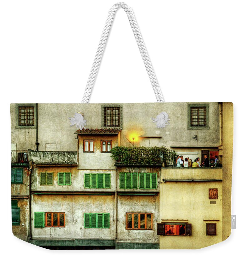 Ponte Vecchio Florence Weekender Tote Bag featuring the photograph Florence - Boats under the Ponte Vecchio sunset by Weston Westmoreland