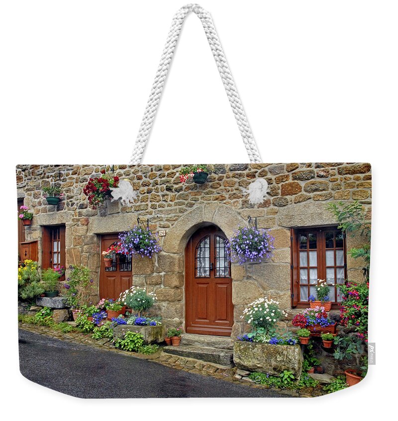 Flowers Weekender Tote Bag featuring the photograph Flowery Doorways in Brittany by Dave Mills