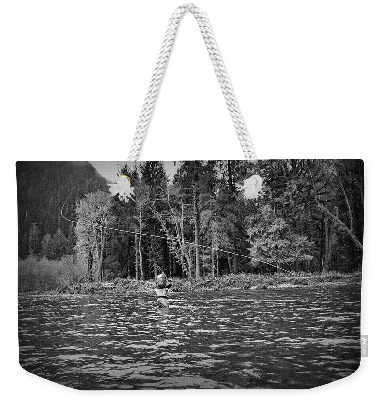  Weekender Tote Bag featuring the photograph Fly on the Swing by Jason Brooks