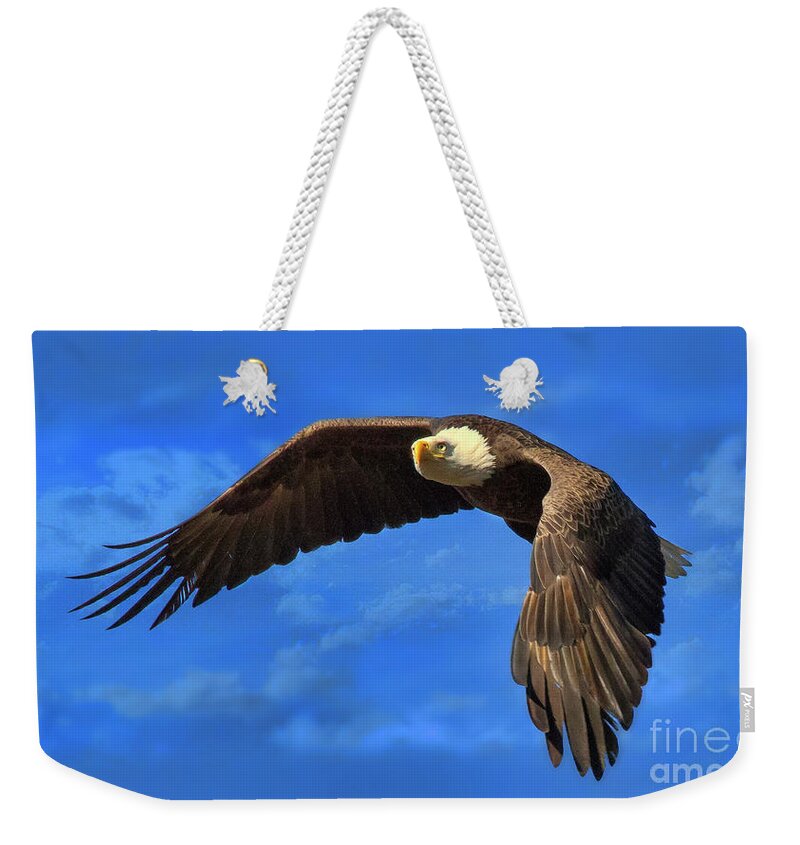 Eagle Weekender Tote Bag featuring the photograph Flying Eagle by Geraldine DeBoer