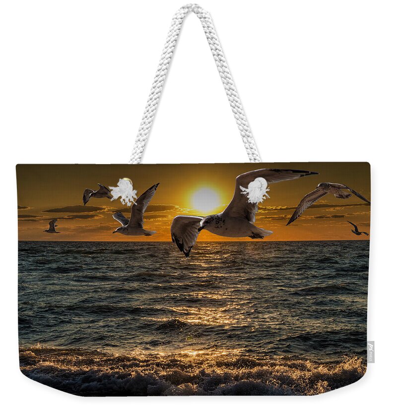 Surf Weekender Tote Bag featuring the photograph Flying Gulls at Sunset by Randall Nyhof