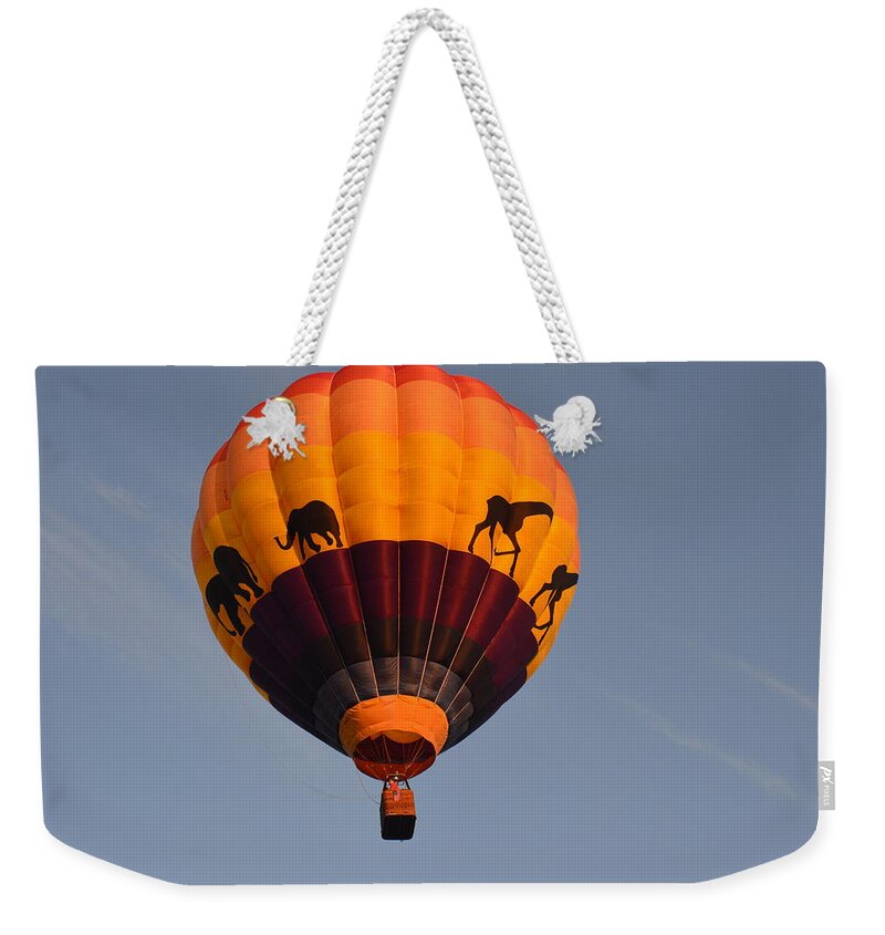 Balloons Weekender Tote Bag featuring the photograph Flying High by Charles HALL