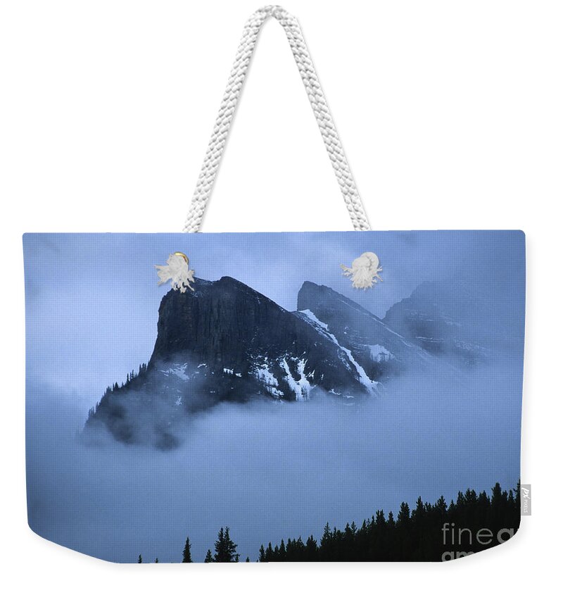 Alberta Weekender Tote Bag featuring the photograph Fog and Clouds by Sandra Bronstein