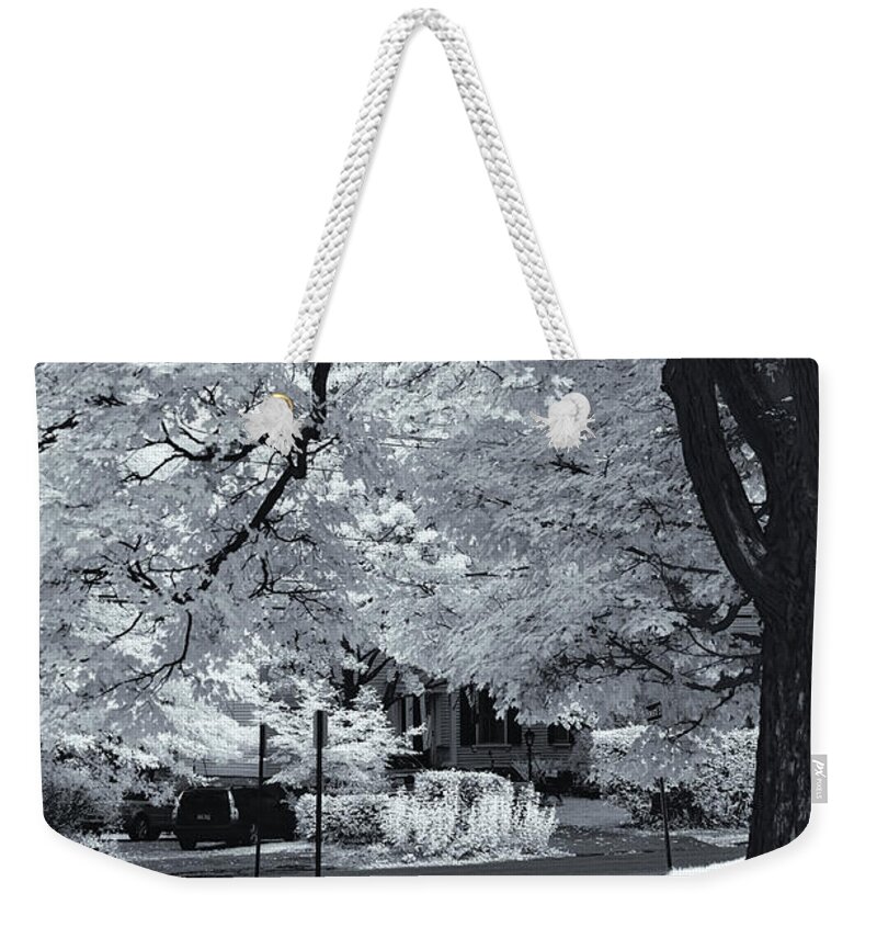 Clematis Vine Weekender Tote Bag featuring the photograph Foliage in Black and White by Tom Singleton