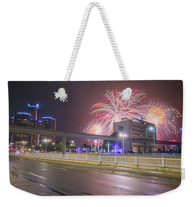 Detroit Weekender Tote Bag featuring the photograph Ford Fireworks in Detroit #1 by Jay Smith