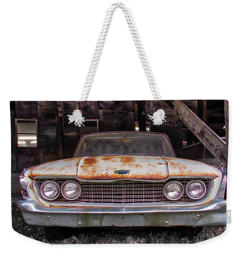 Antique Autos Weekender Tote Bag featuring the photograph Ford In A Barn by Guy Whiteley
