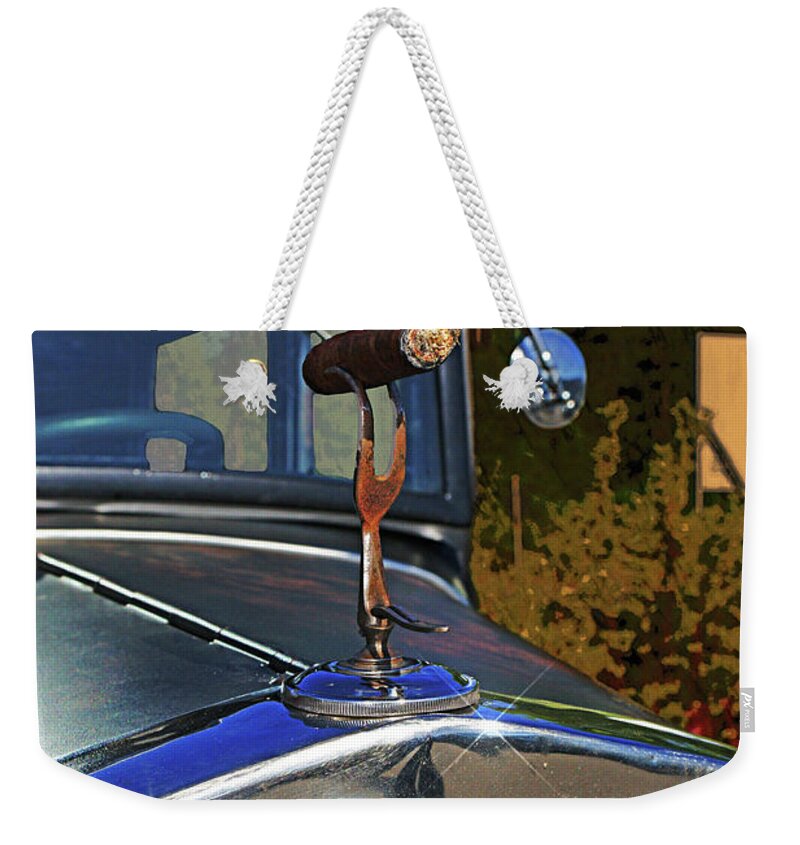 Cars Weekender Tote Bag featuring the photograph Ford Smokin Cigar Hood Ornament by Randy Harris