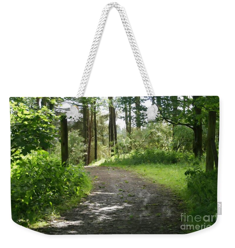 Forest Weekender Tote Bag featuring the photograph Forest path. by Elena Perelman