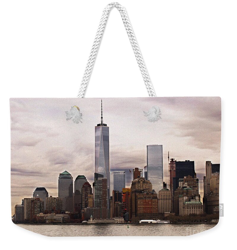 New York City Weekender Tote Bag featuring the photograph Freedom by Dorothy Lee