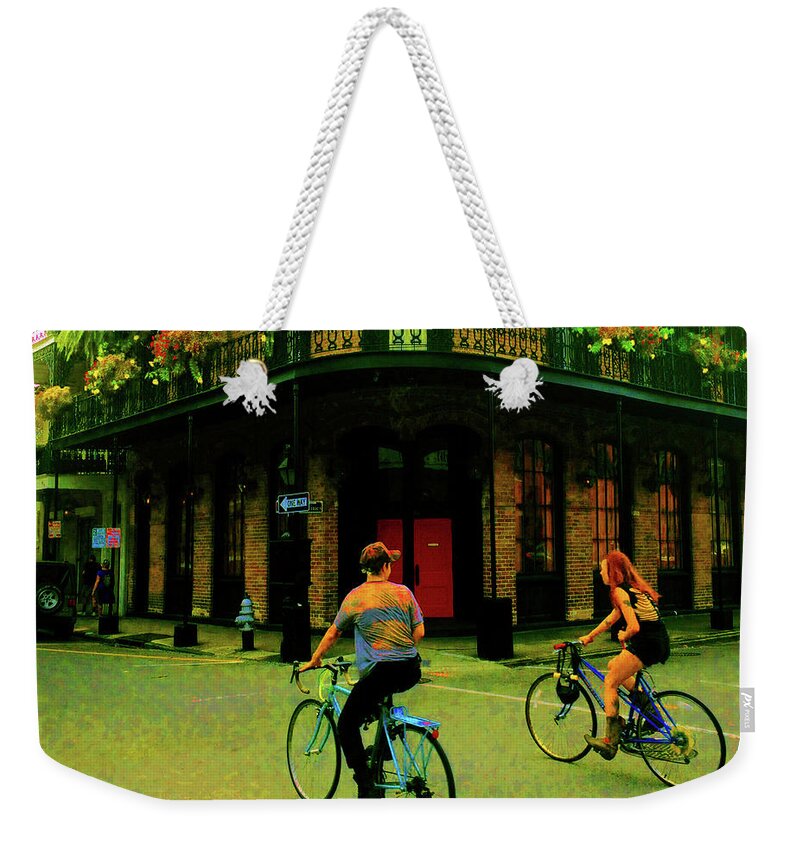 New Or Lens Weekender Tote Bag featuring the photograph French Quarter Flirting On The Go by CHAZ Daugherty