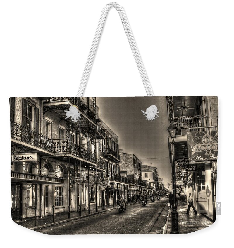 French Quarter Weekender Tote Bag featuring the photograph French Quarter Ride by Greg and Chrystal Mimbs