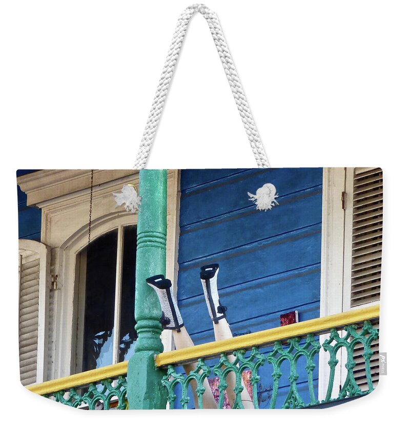 New Orleans Weekender Tote Bag featuring the photograph Frenchmen St. Balcony Legs by Amelia Racca