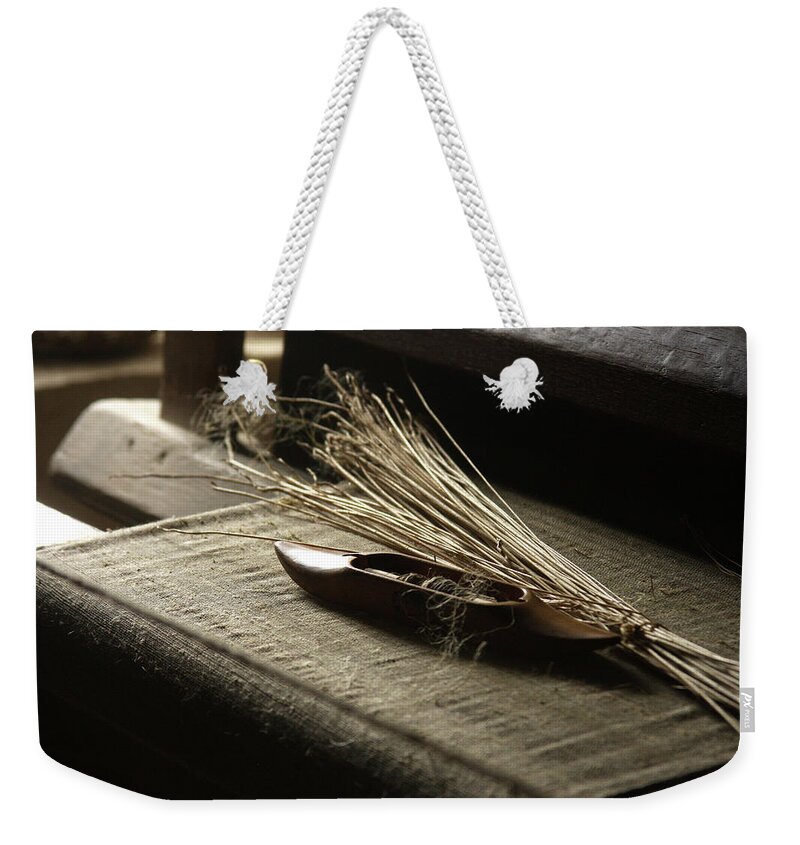 Loom Weekender Tote Bag featuring the photograph From flax to linen by Emanuel Tanjala