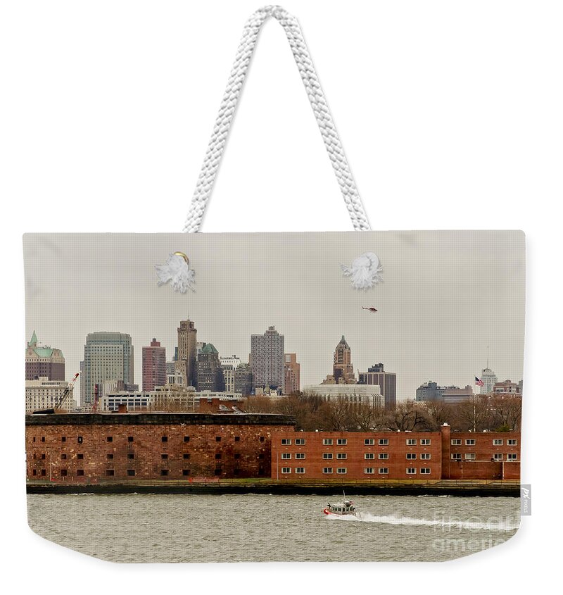 Ny Weekender Tote Bag featuring the photograph From the sky and from water. by Elena Perelman