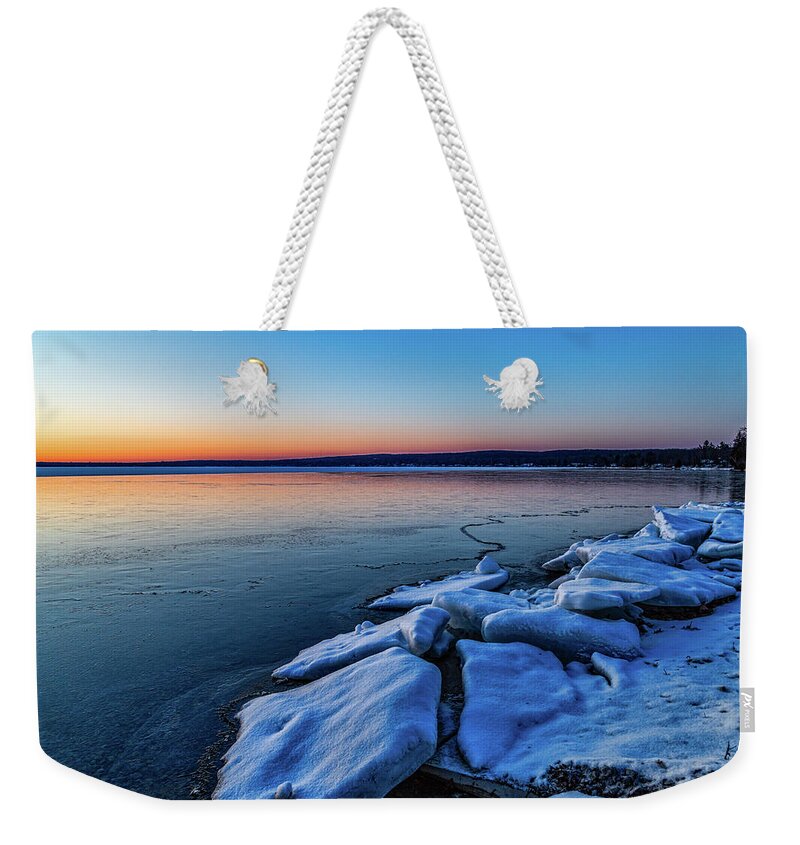 Higgins Lake Weekender Tote Bag featuring the photograph Frozen in time by Joe Holley