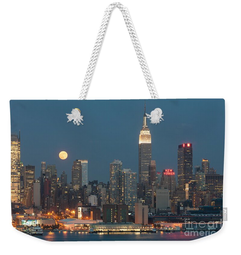Clarence Holmes Weekender Tote Bag featuring the photograph Full Moon Rising Over New York City II by Clarence Holmes