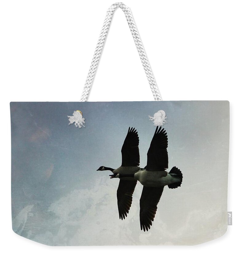  Weekender Tote Bag featuring the photograph Geese by Elizabeth Harllee