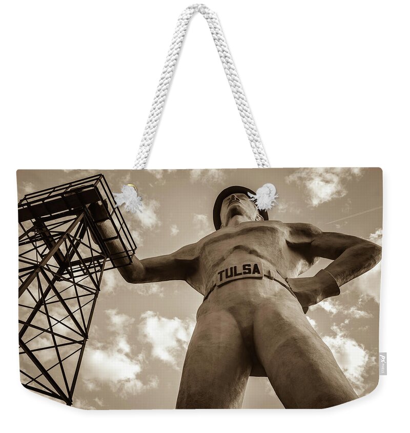 American Weekender Tote Bag featuring the photograph Giant Tulsa Driller Statue - Sepia Edition by Gregory Ballos