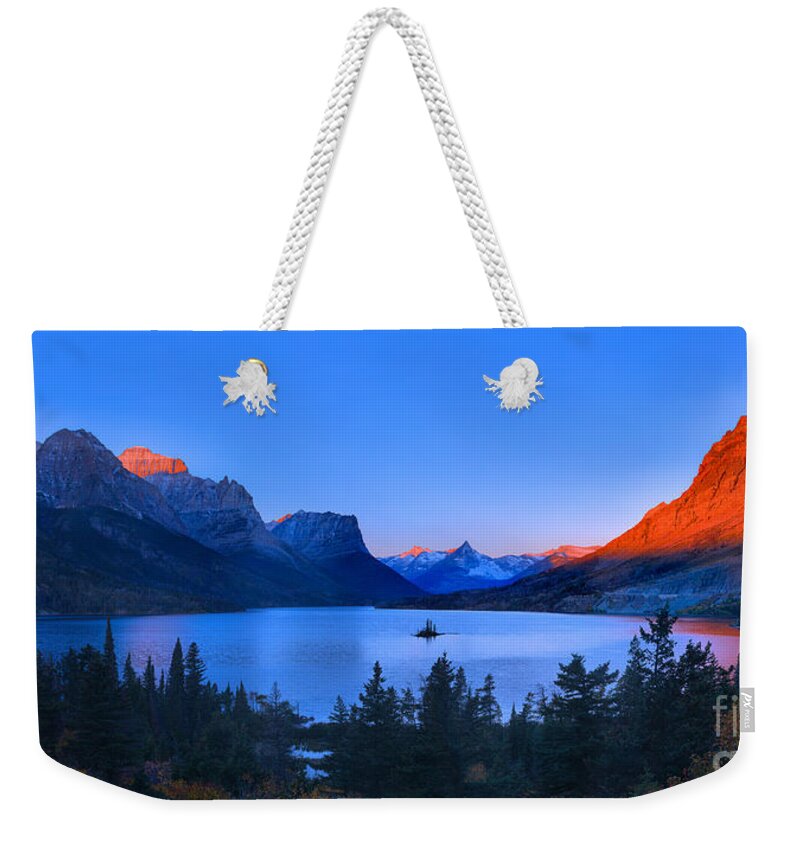 St Mary Weekender Tote Bag featuring the photograph Glacier Orange Glow Over St. Mary by Adam Jewell