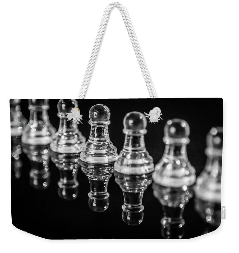  Weekender Tote Bag featuring the photograph Glass Pawns Reflected - with logo by Melissa Lipton