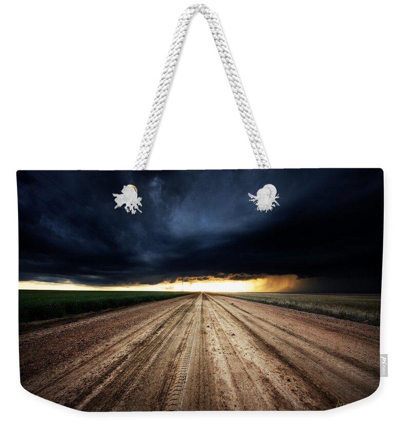 Weather Weekender Tote Bag featuring the photograph God's Golden Glow by Brian Gustafson