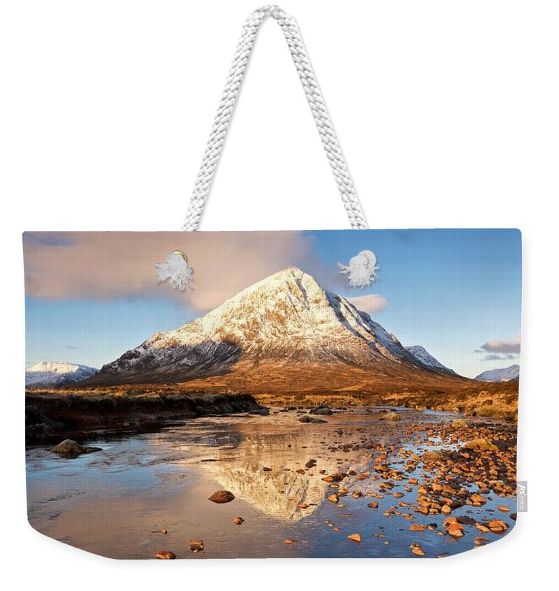 Glencoe Weekender Tote Bag featuring the photograph Golden light in Glencoe by Stephen Taylor