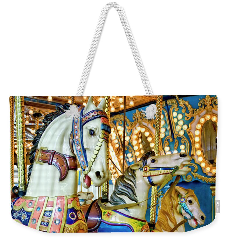 Jigsaw Puzzle Weekender Tote Bag featuring the photograph Grab the Brass Ring by Carole Gordon