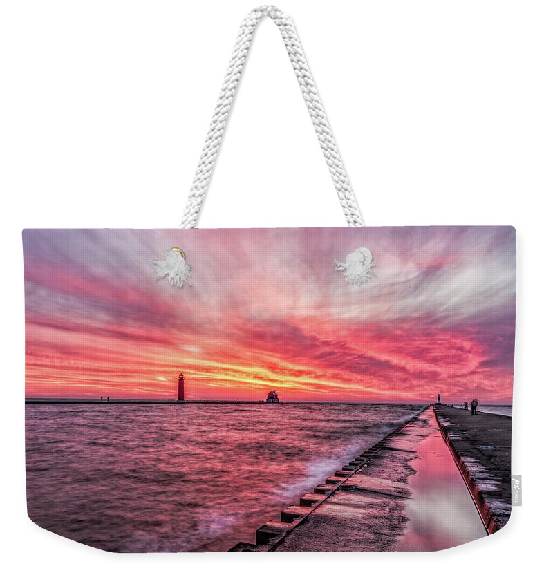 Grand Haven Michigan Weekender Tote Bag featuring the photograph Grand Haven Heat by Joe Holley