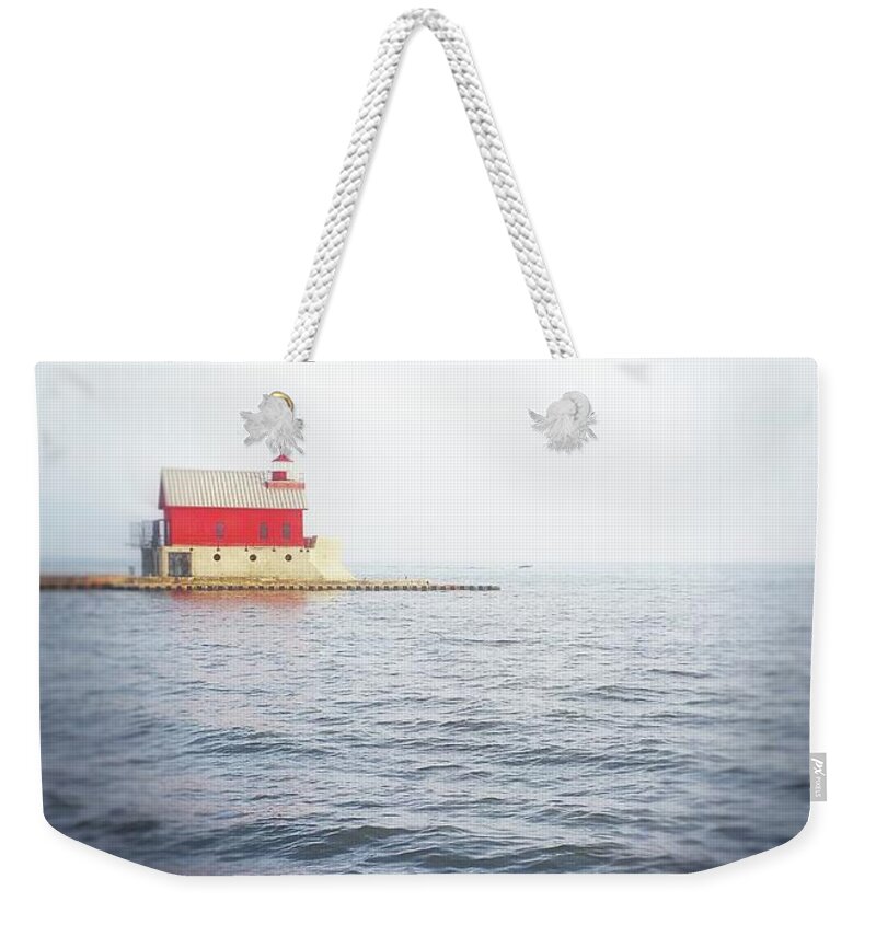 Grand Haven Weekender Tote Bag featuring the photograph Grand Haven Lighthouse from North Pier by Michelle Calkins